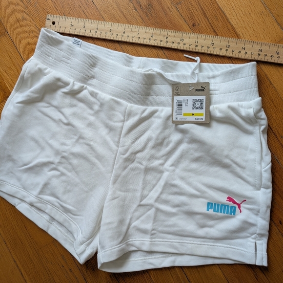 155.Nwt Puma White Shorts with Pink and Blue Logo - Picture 1 of 2
